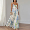 Araminta | Plissiertes Maxi-Kleid mit Iris-Blumenmuster