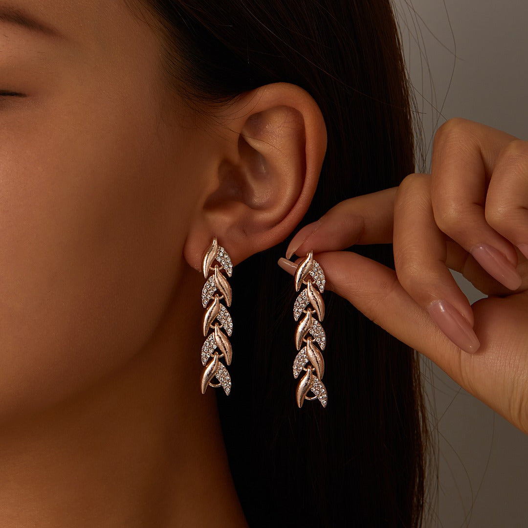 Elegantes Fischschwanz-Ohrringe mit Strass